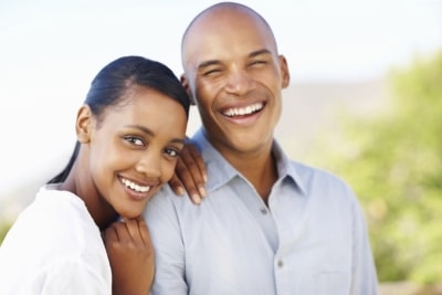 Man and woman smiling