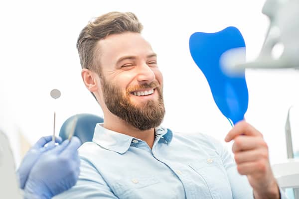 Man with great smile at the dental office