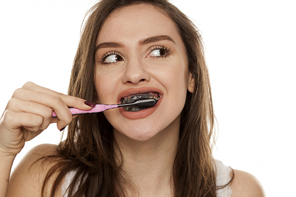 Brushing-Teeth-With-Charcoal